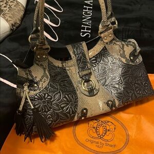 Sharif Embossed Leather Bag Intricate Detailing